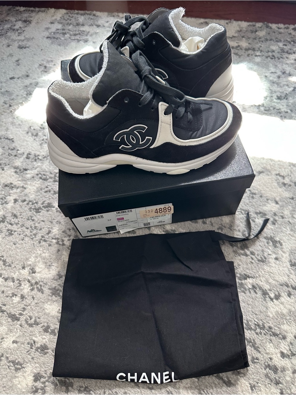 Chanel women’s black sneakers with original box size 7